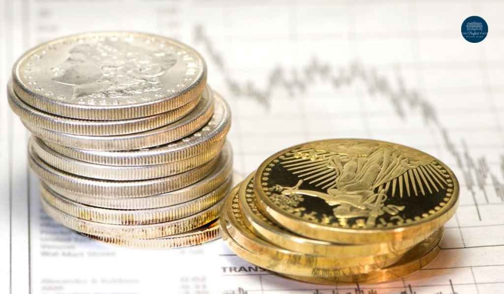 A stack of silver and gold coins on top of a graph.