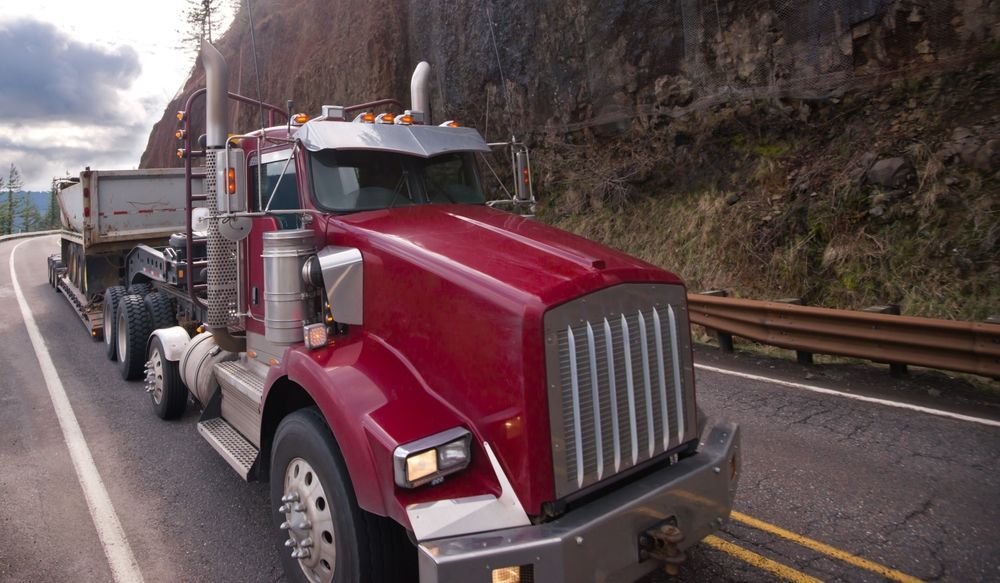 Truck with step down semi trailer - Transport Company in Emerald