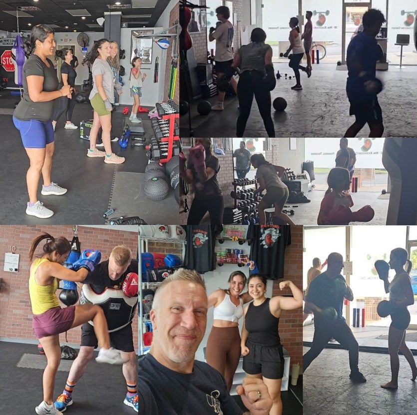 People working out and boxing in a gym. Variety of ages and exercises; some wear athletic gear.