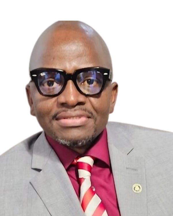 A bald man wearing glasses and a suit and tie