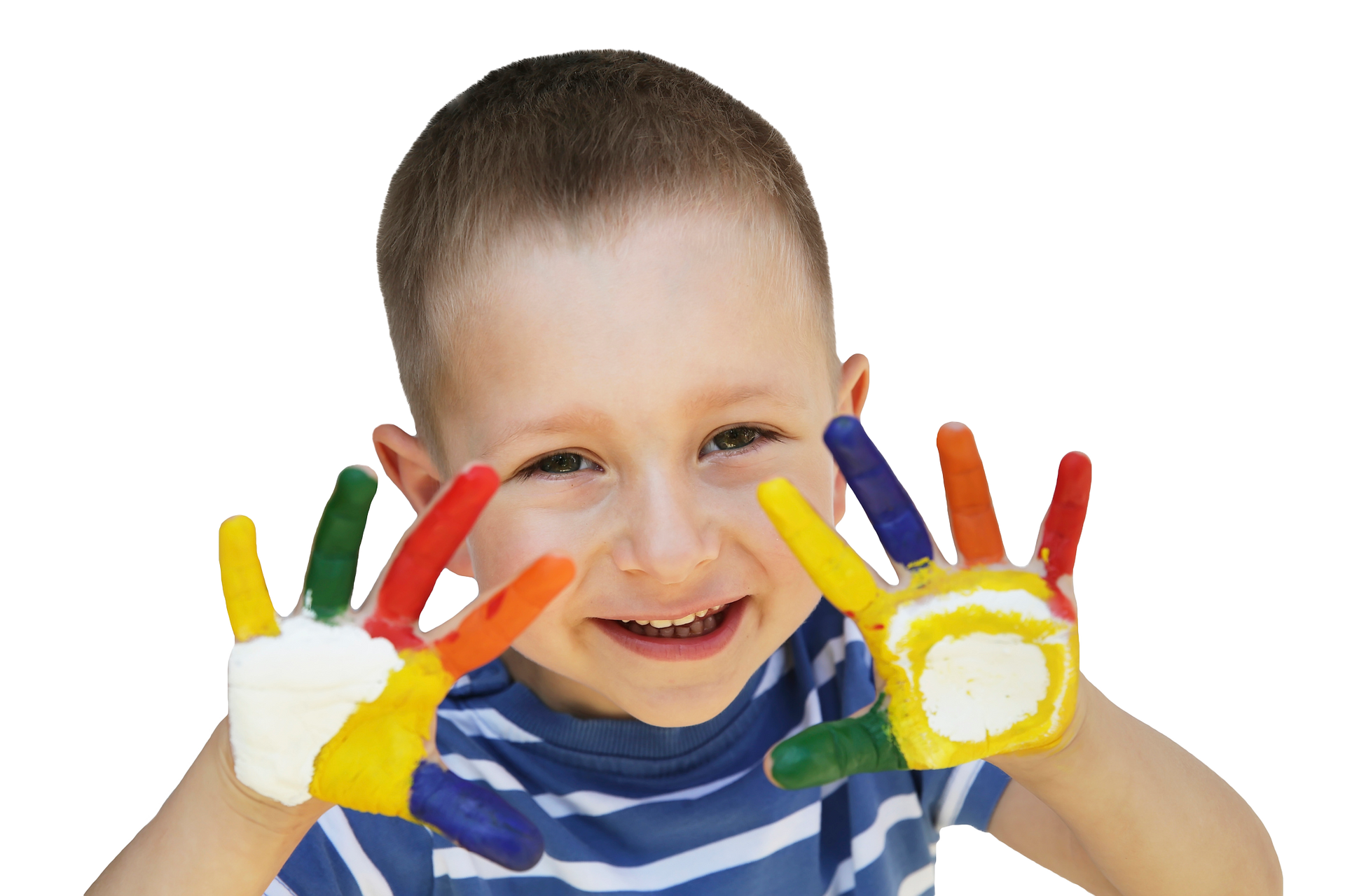 Boy with colorful painted hands smiles, showing off his artwork.