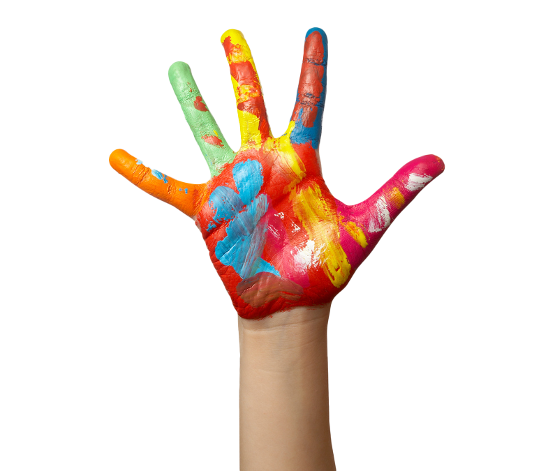 Hand with colorful paint covering palm and fingers.