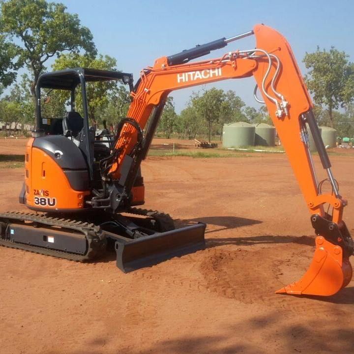 An Orange Hitachi Excavator Is Parked In A Dirt Field — Territory Industries Pty Ltd In Larrimah, NT