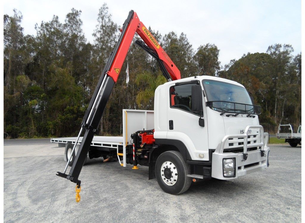 A White Truck With A Crane Attached To It — Territory Industries Pty Ltd In Uralla, NT