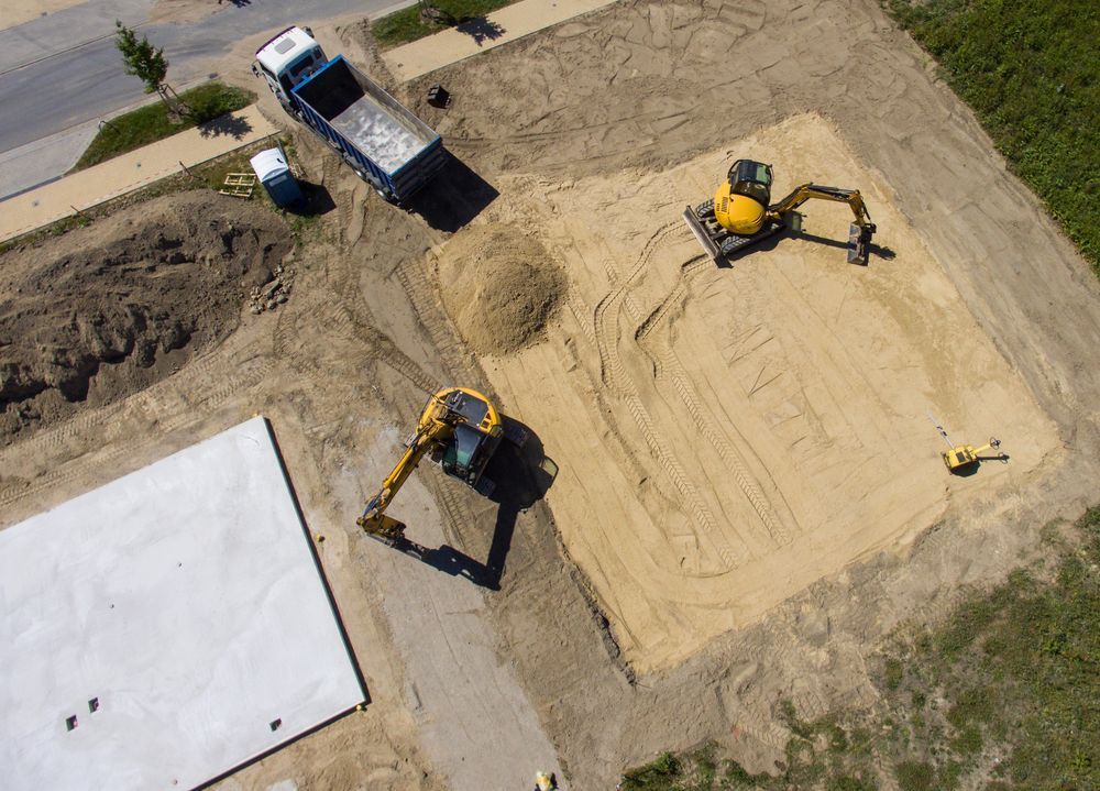 An Aerial View Of A Construction Site With Two Excavators And A Truck — Territory Industries Pty Ltd In Larrimah, NT