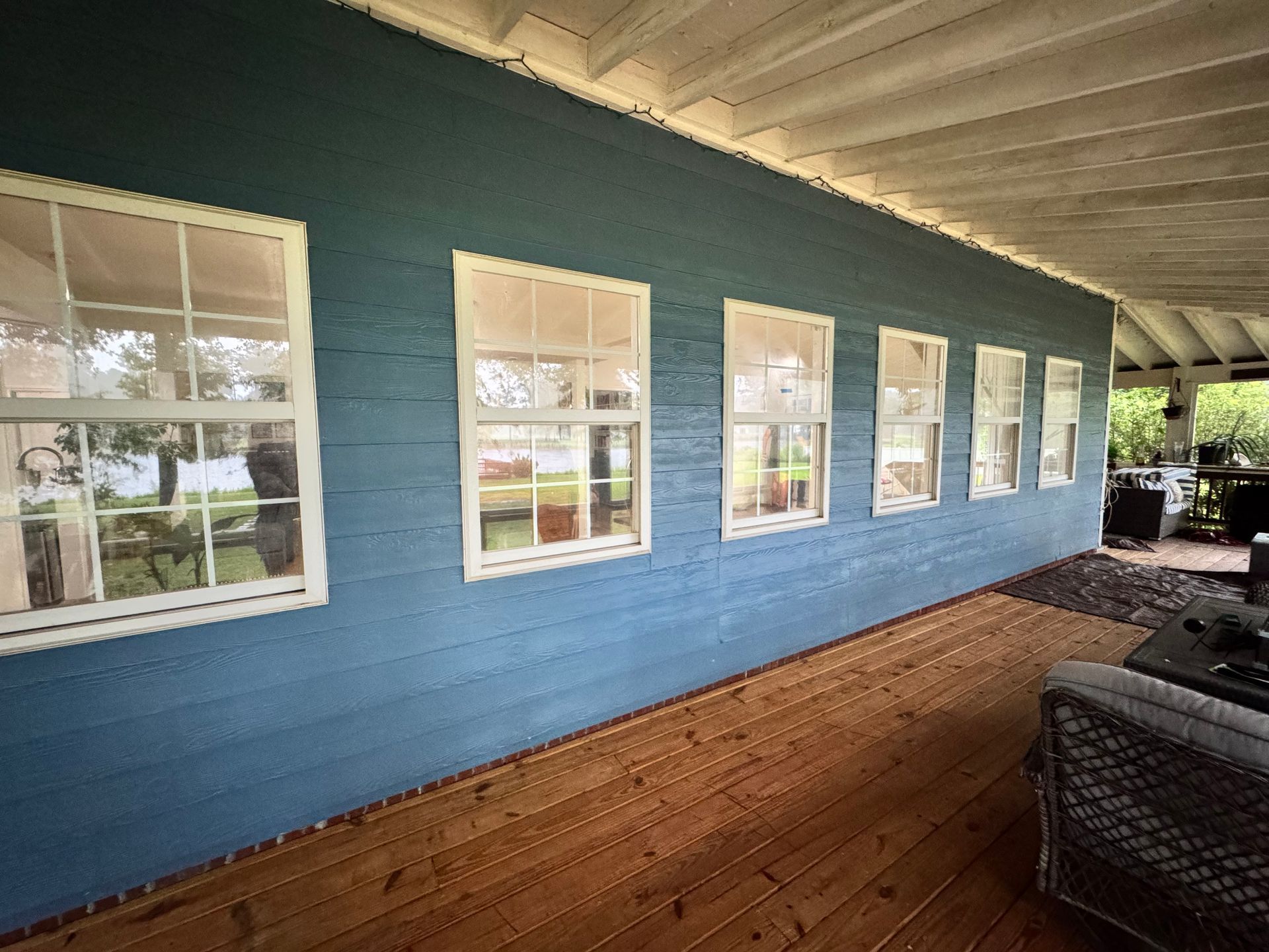 Residential home exterior with installed energy-efficient windows