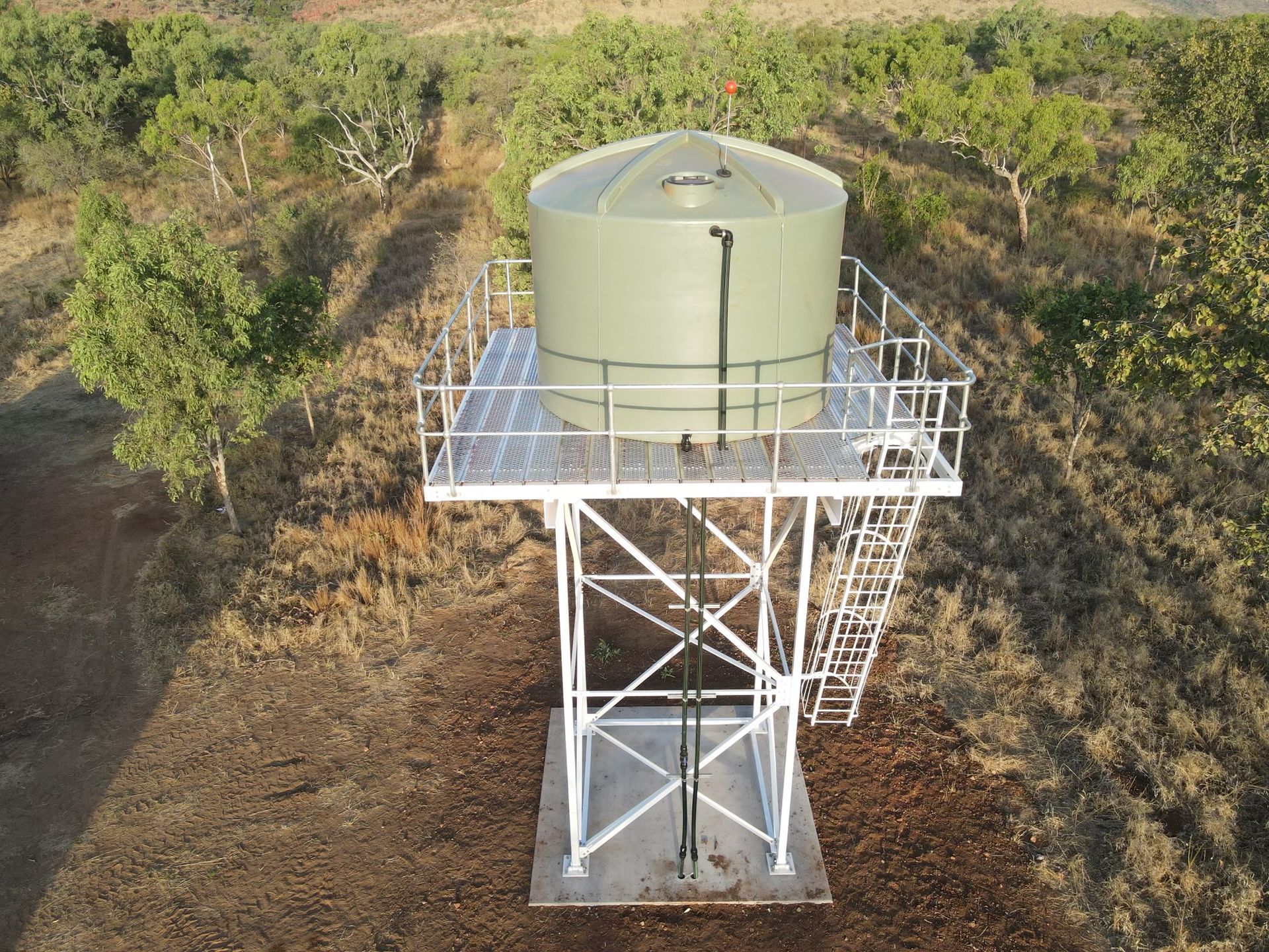Water Tank With Metal Frame — Metal Fabrication In Yarrawonga, NT