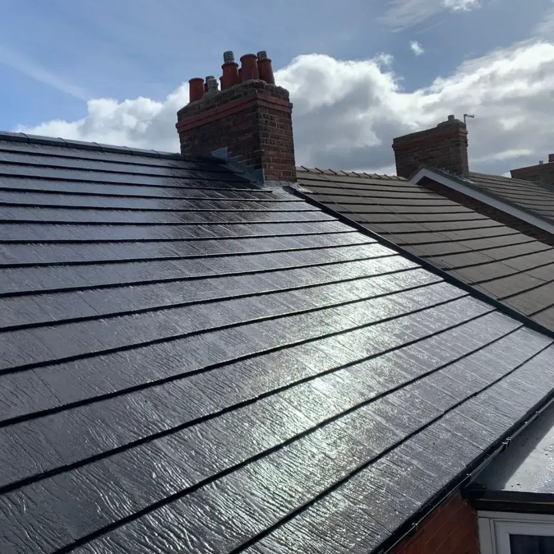 black tiled roof reroofed