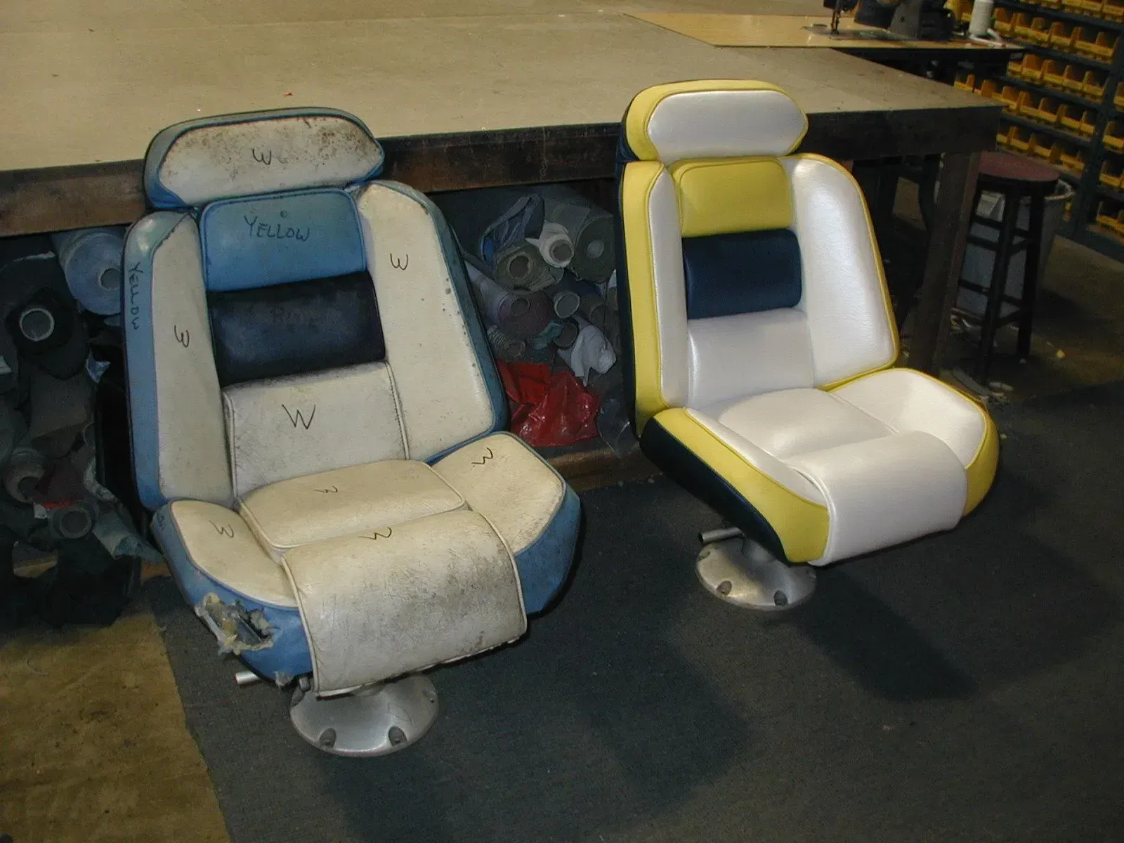 Two chairs are sitting next to each other on a table