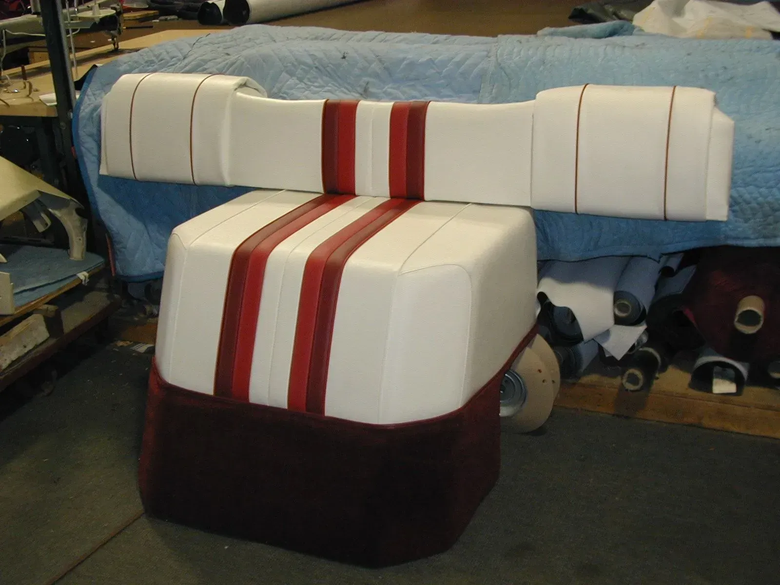 A chair with red and white stripes on it