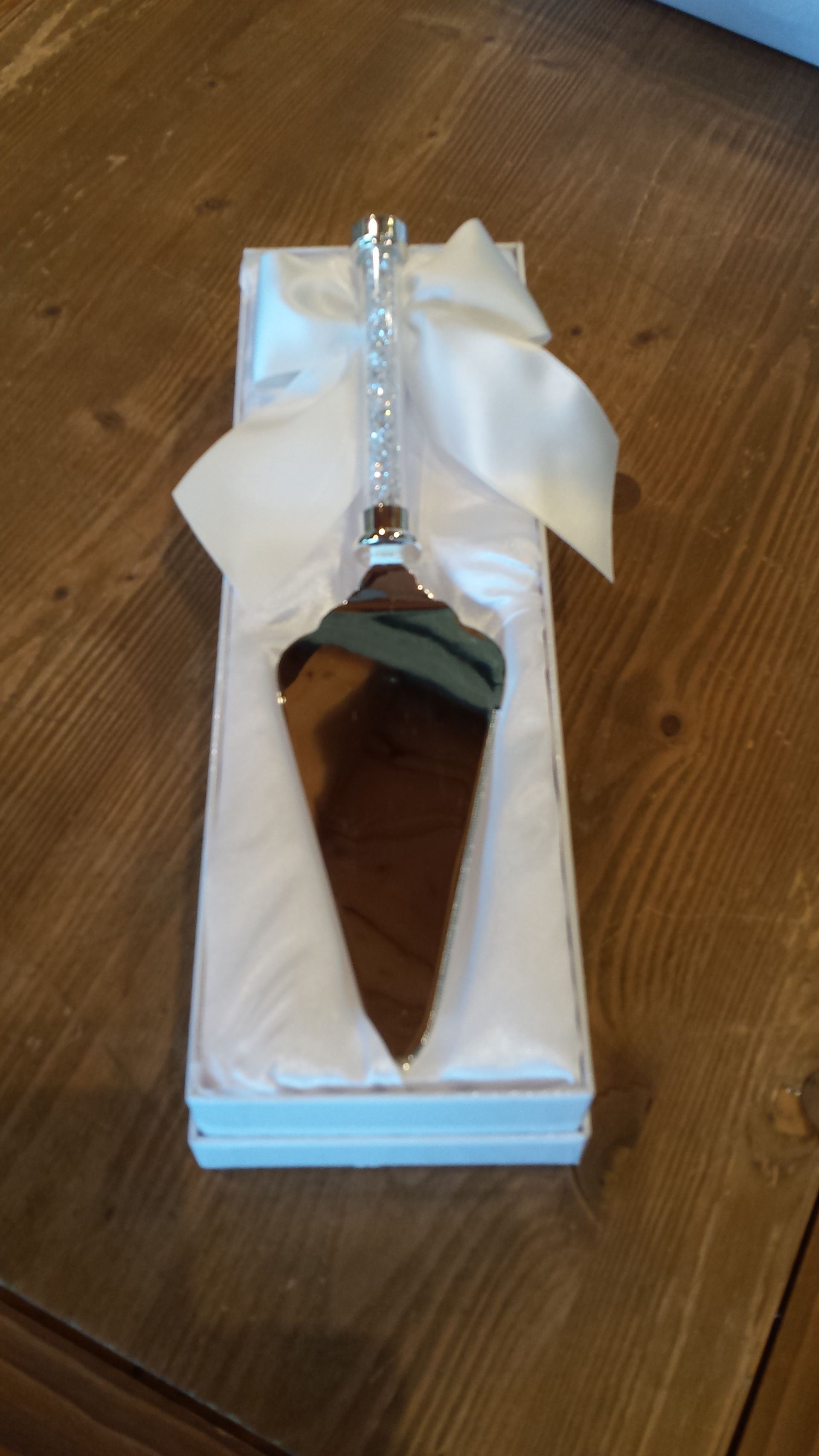 bomboniera con paletta per torta nuziale