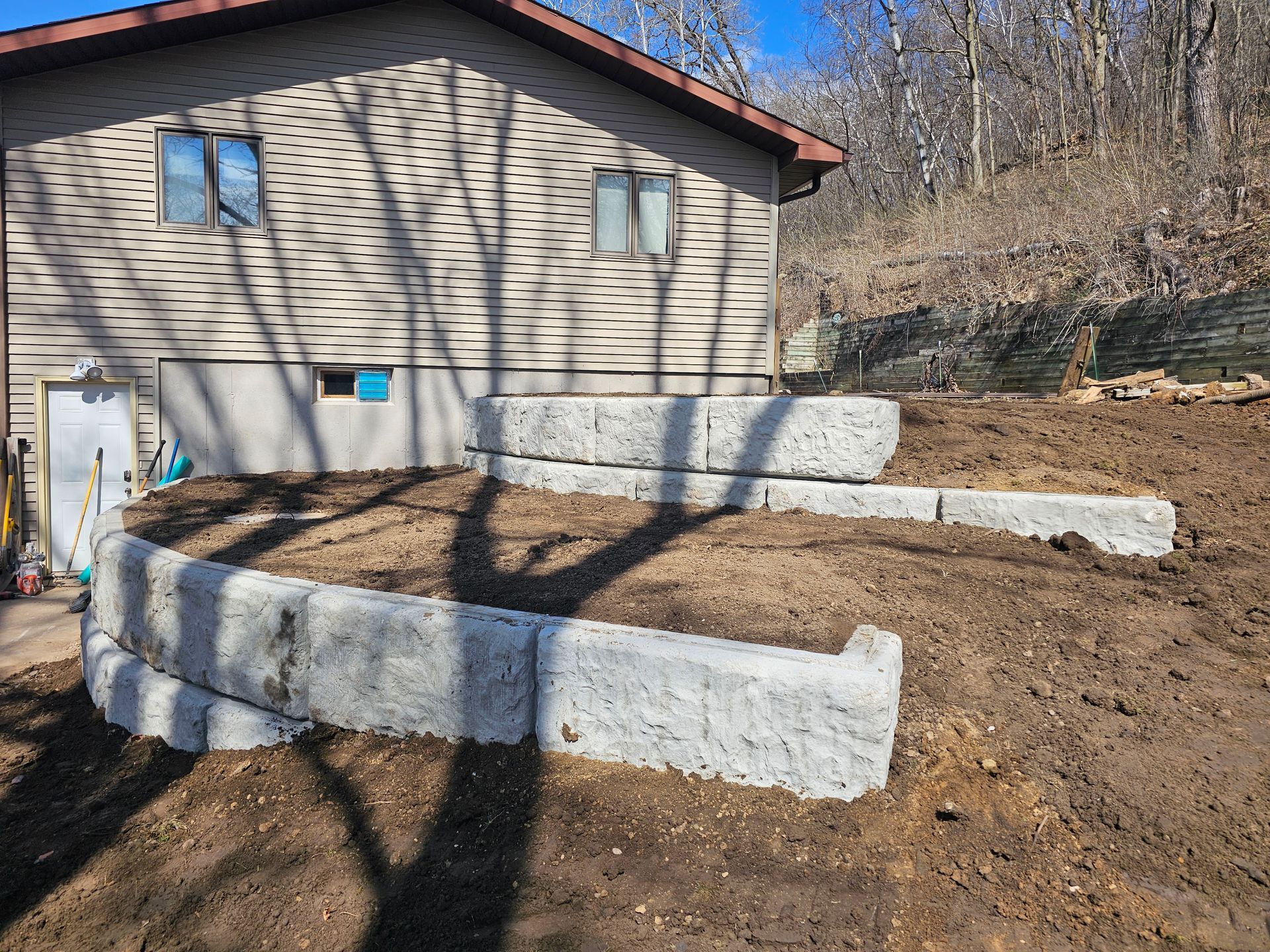A house with a lot of dirt in front of it