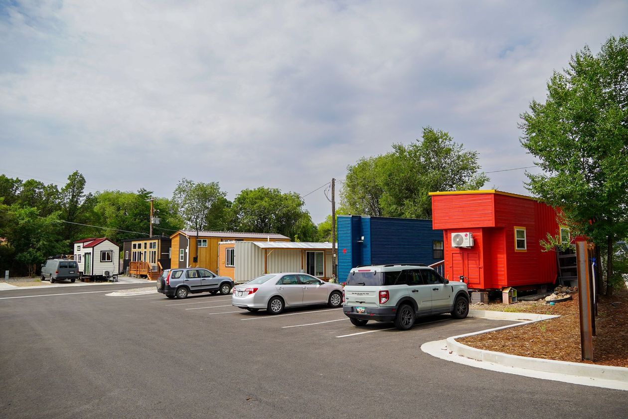 View of a line of colorful tiny homes.