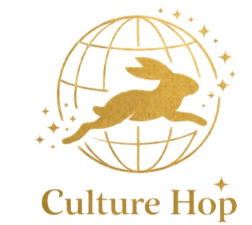 Culture hop logo of a bunny hopping around a globe in gold, with stars to show the magic of exploring other cultures