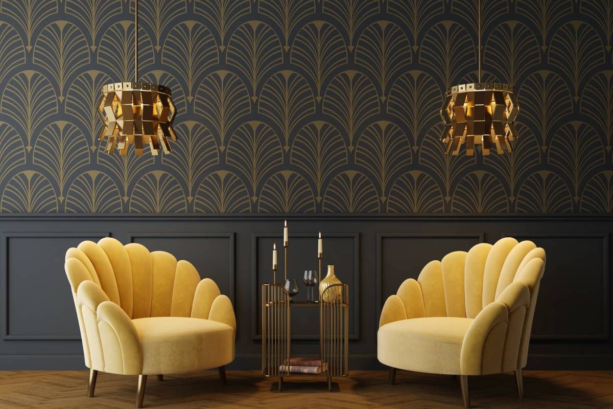 Sitting room with moody, dark wallpaper, complimented with gold light fixtures and art deco yellow chairs near Vestal, NY