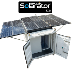 Solar-powered refrigeration unit in a shipping container with solar panels extended. White exterior, open doors.