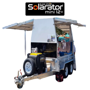 Solararator mini 12+ mobile unit, with a white, aluminum body, solar panel awnings, and a black and yellow generator on a trailer.