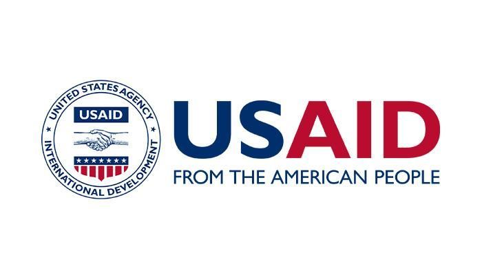 USAID logo: Blue emblem with handshake, text "USAID" in blue and red. "From the American People" below.