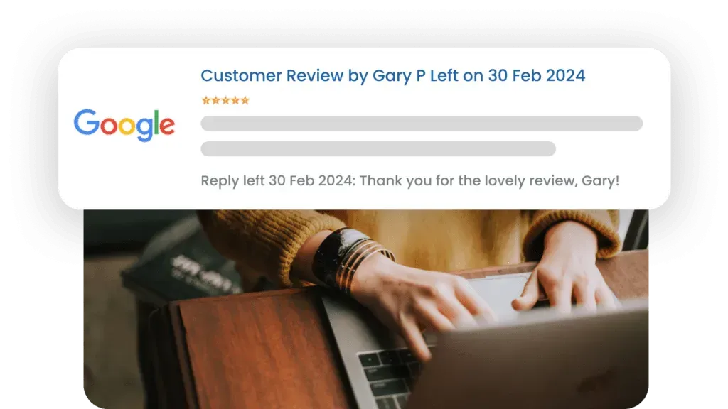 A person is typing on a laptop computer.