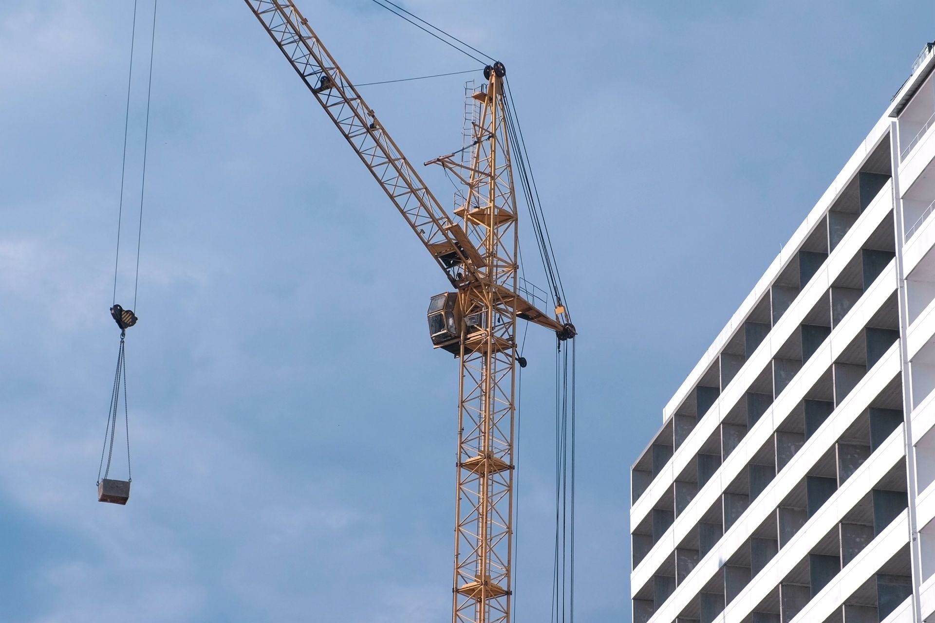 Construction of a multi-storey building. Construction of a multi-storey building.