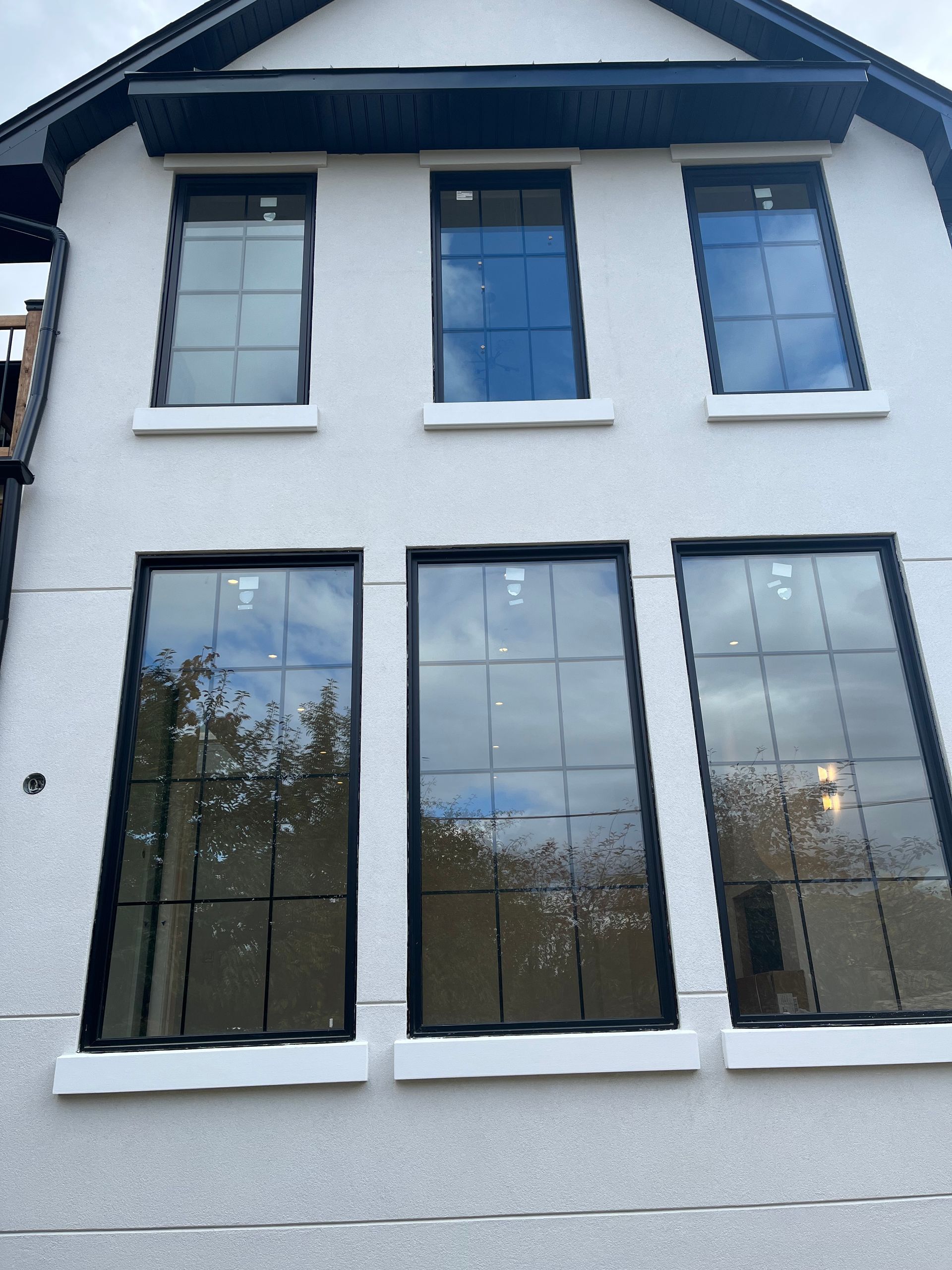 A white building with a lot of windows on it