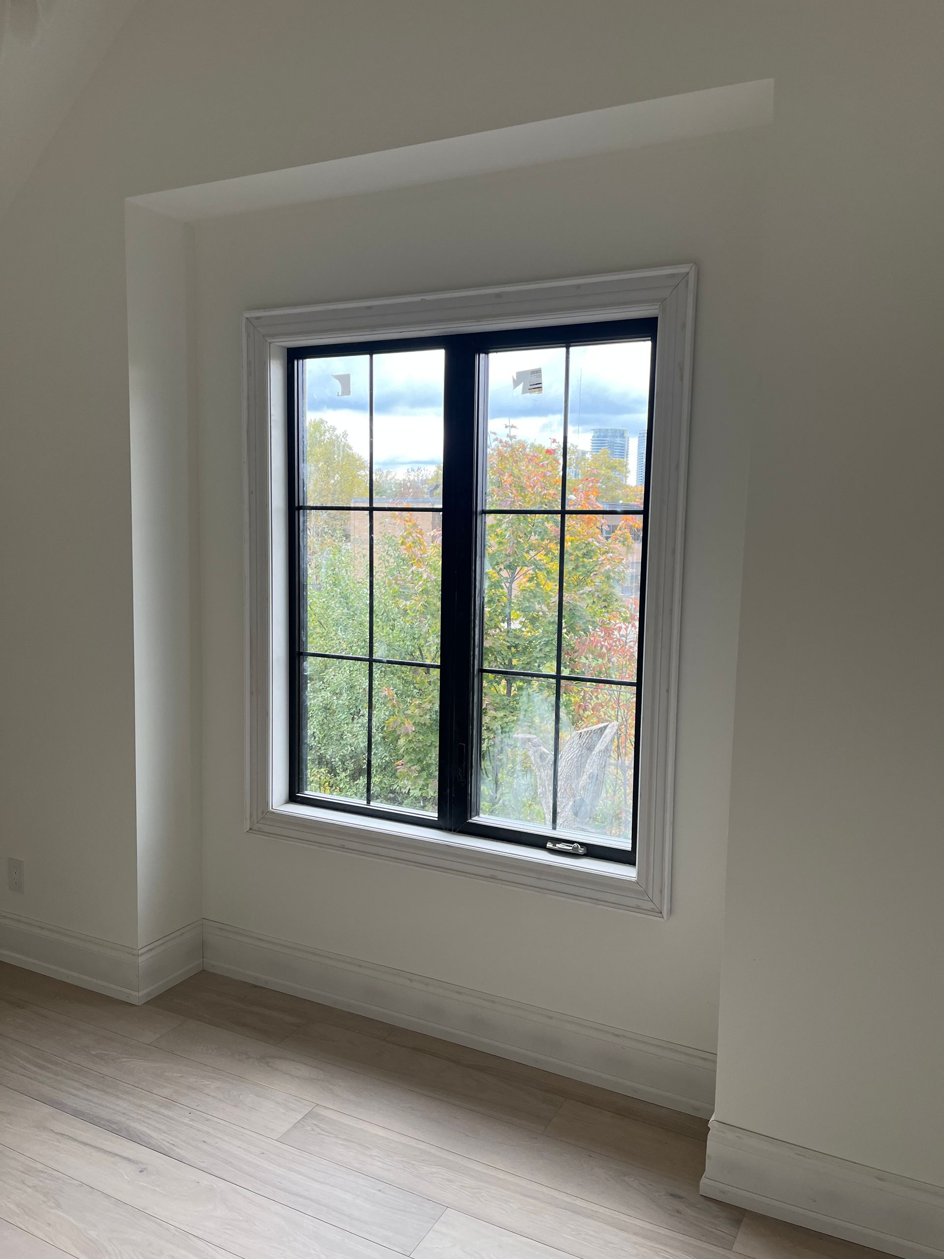 There is a large window in the middle of the room.