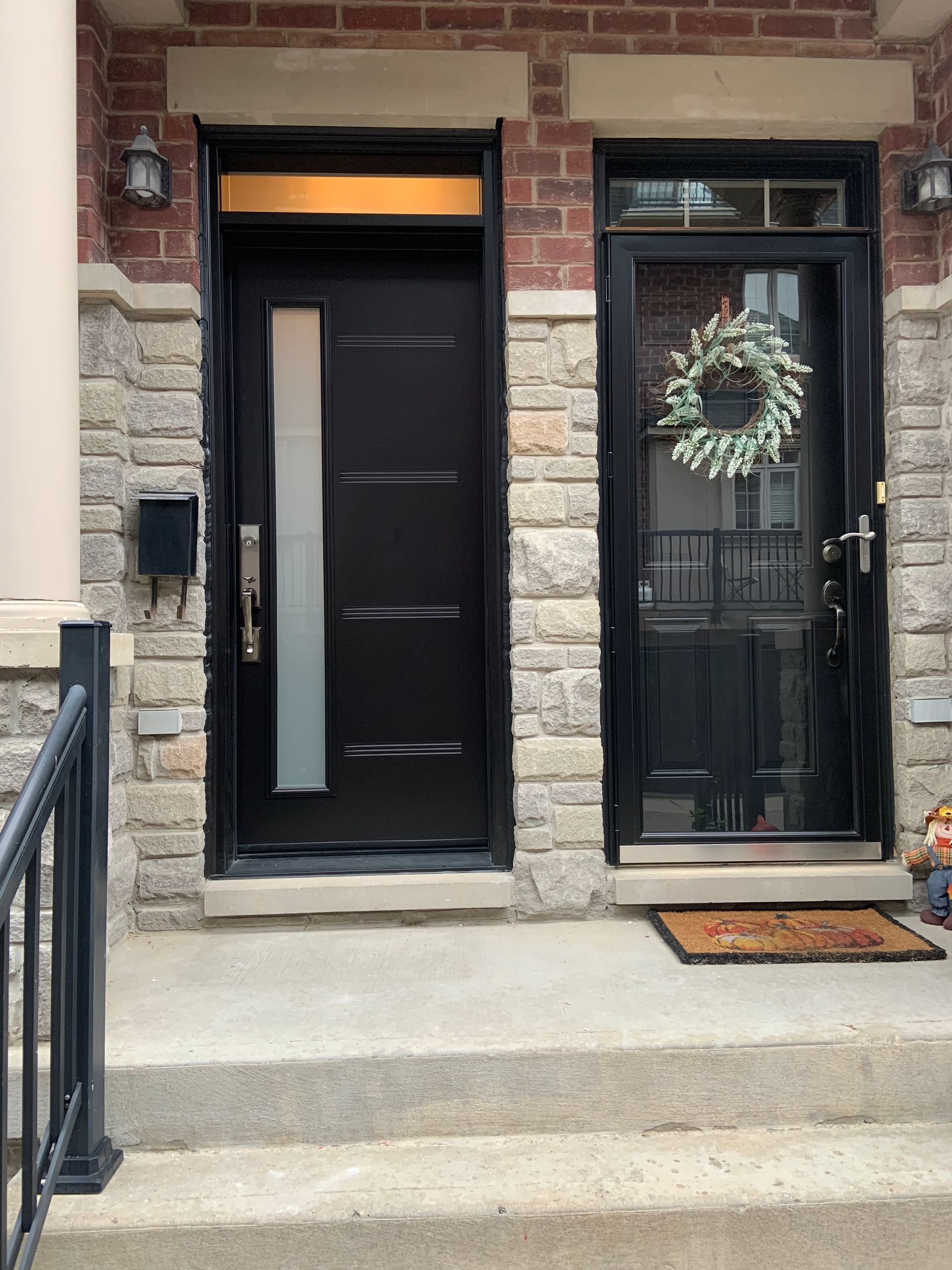 The front door of a house with a wreath on it