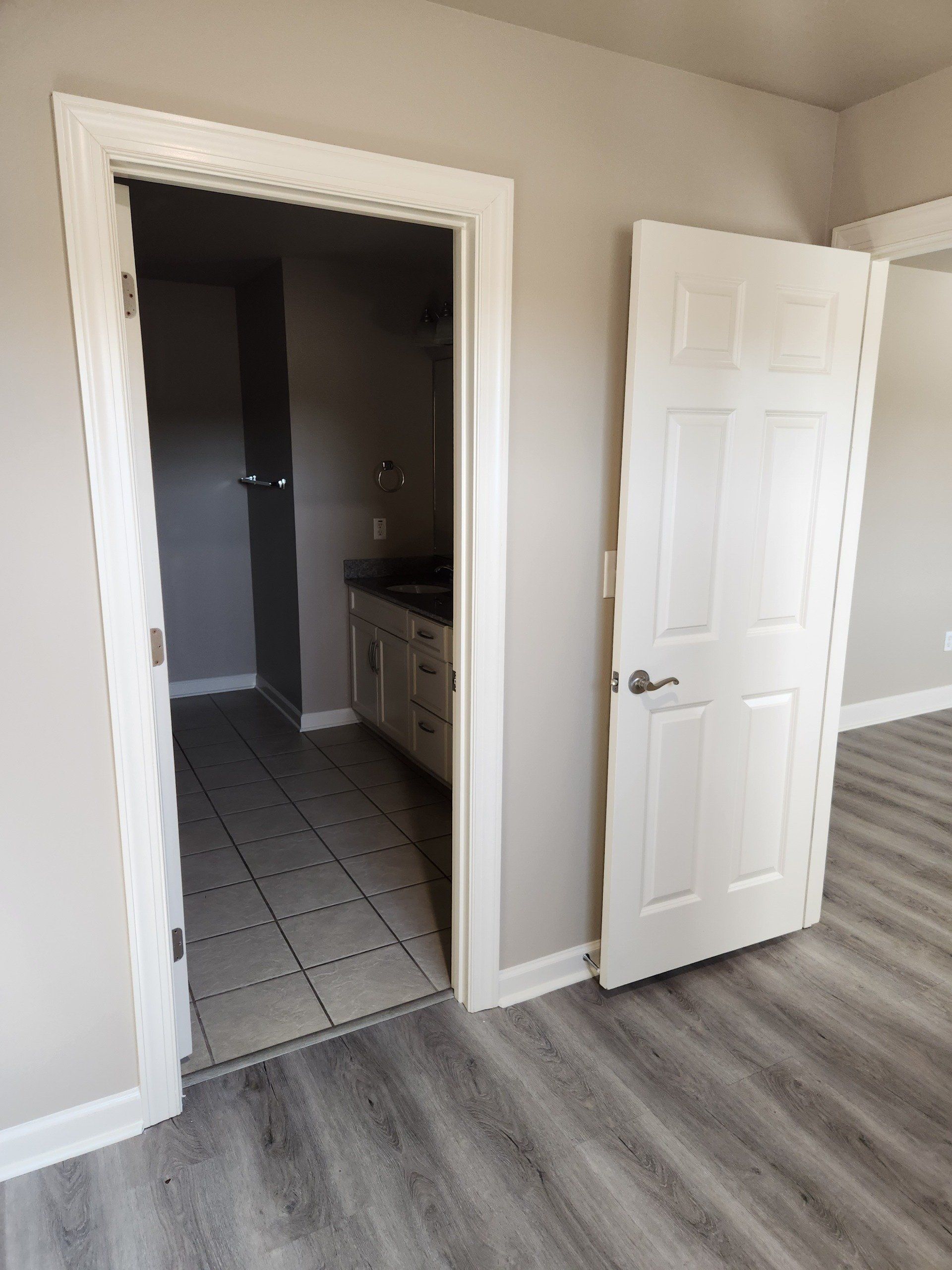 Bedroom with grey flooring