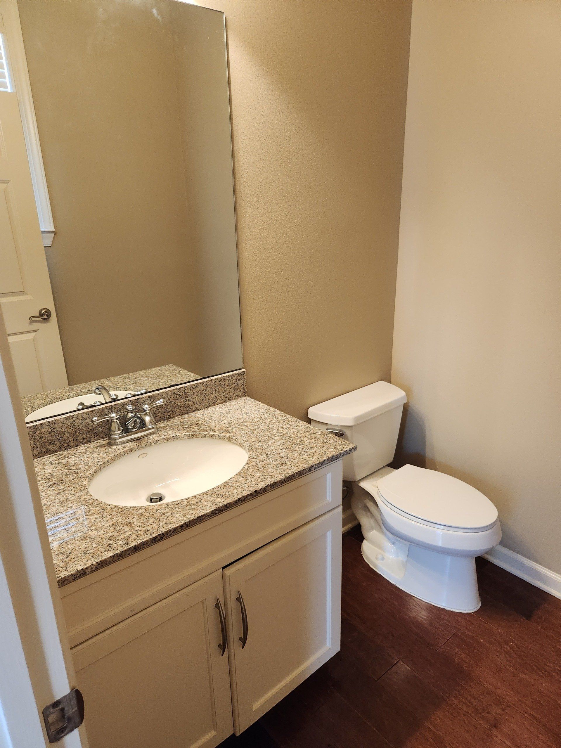 Bathroom with sink and toilet