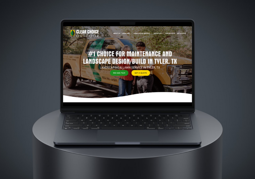 Laptop displaying a website for Clear Choice Landscaping with text