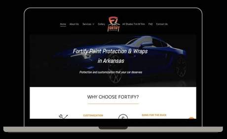 Macbook mockup with website for local window tinting and wrap shop in hot springs, arkansas