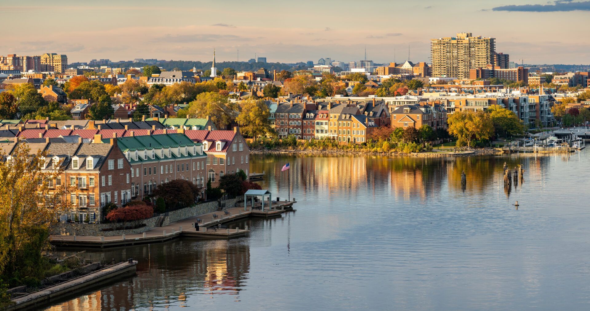 An aerial view of a city surrounded by water and buildings.