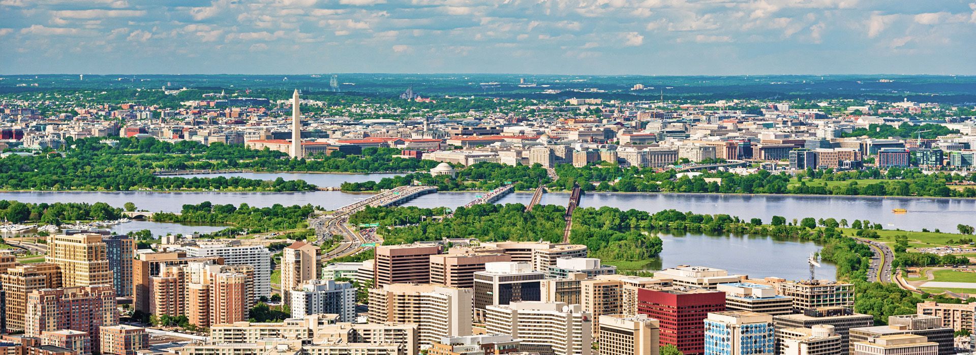 An aerial view of a city with a river running through it.