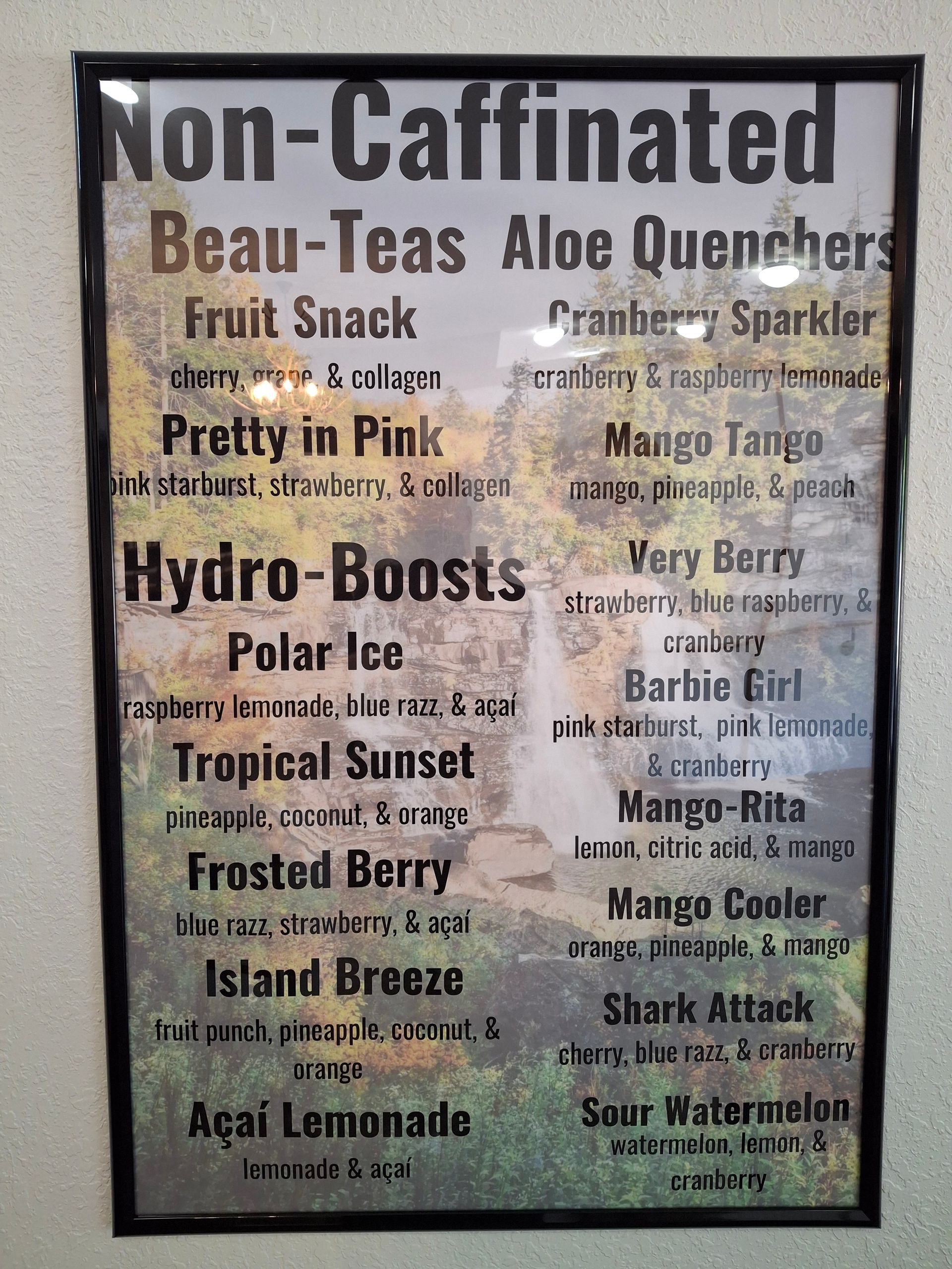A sign that says non-caffeinated beau-teas aloe quenchers
