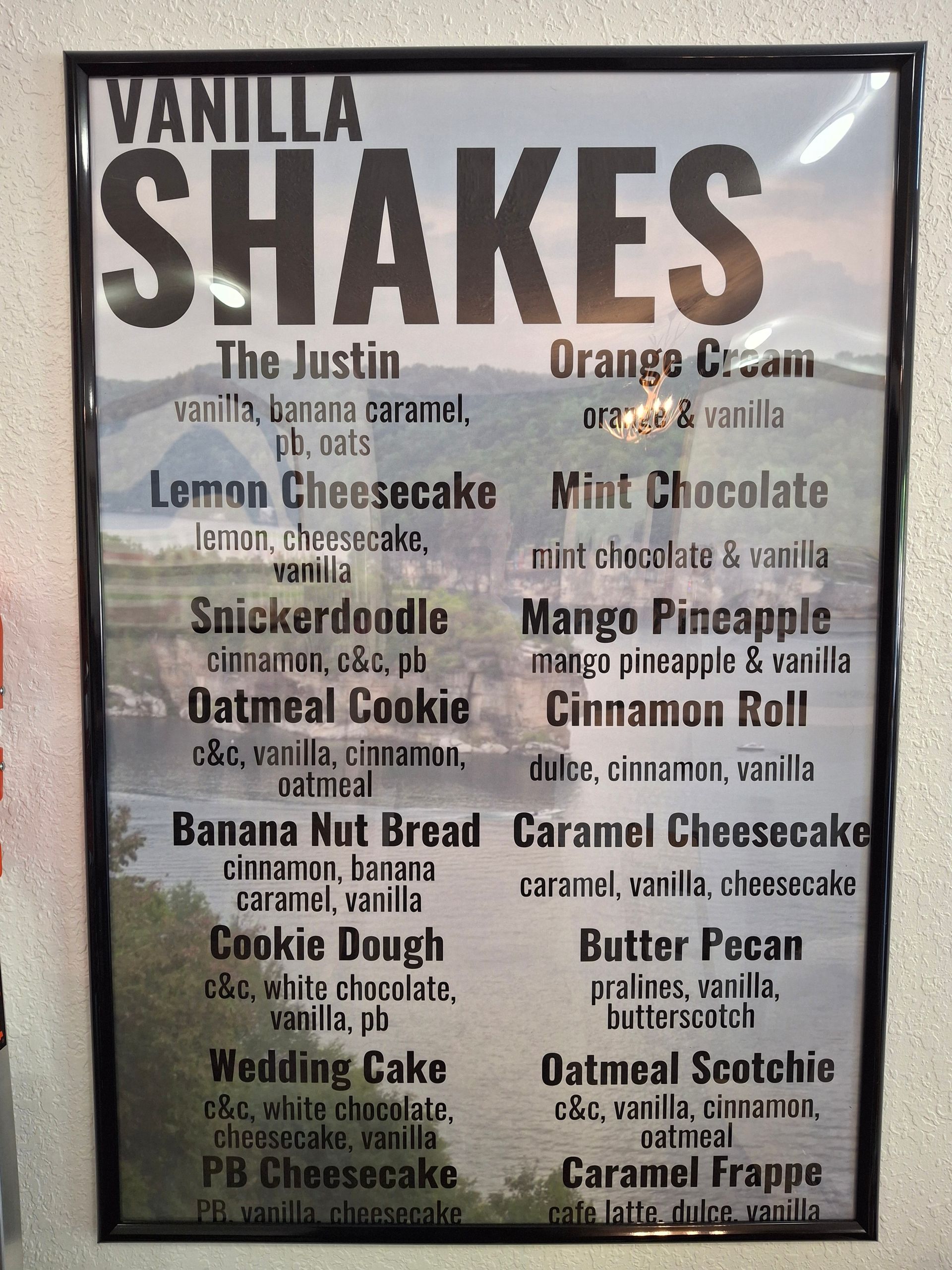 A sign that says vanilla shakes on it