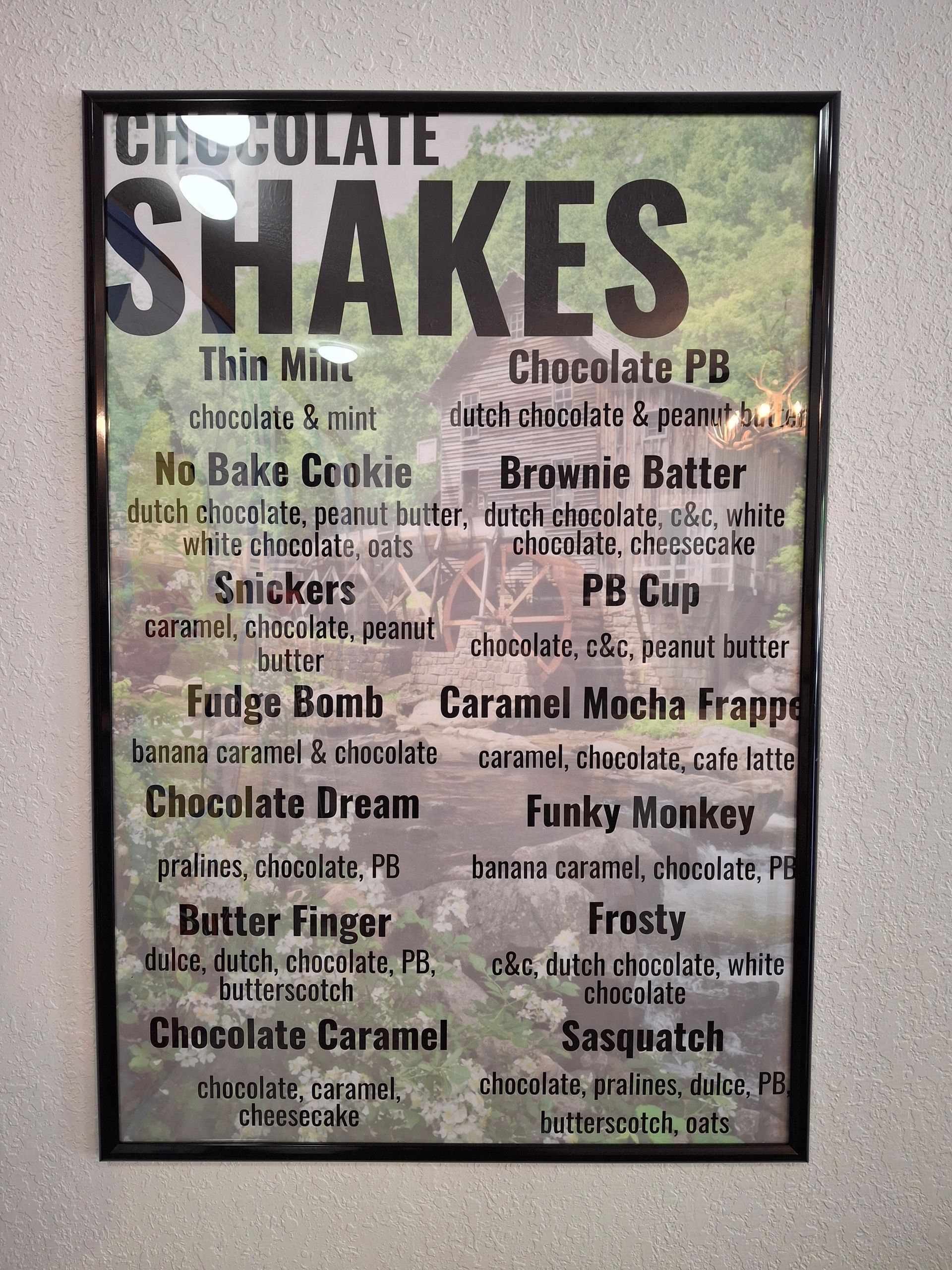 A sign that says chocolate shakes on it