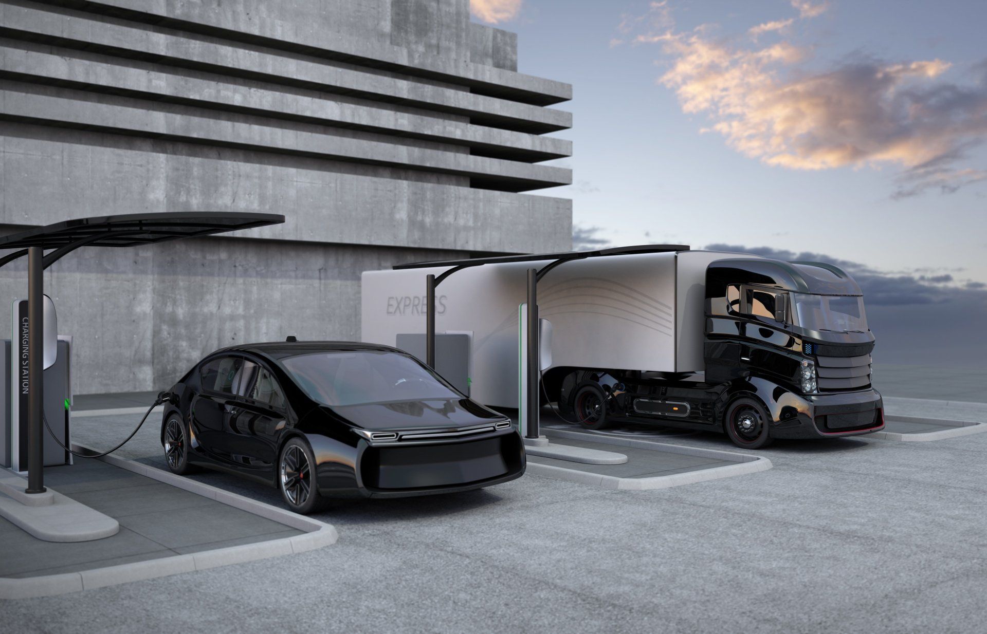 semi truck and sedan parked and charging