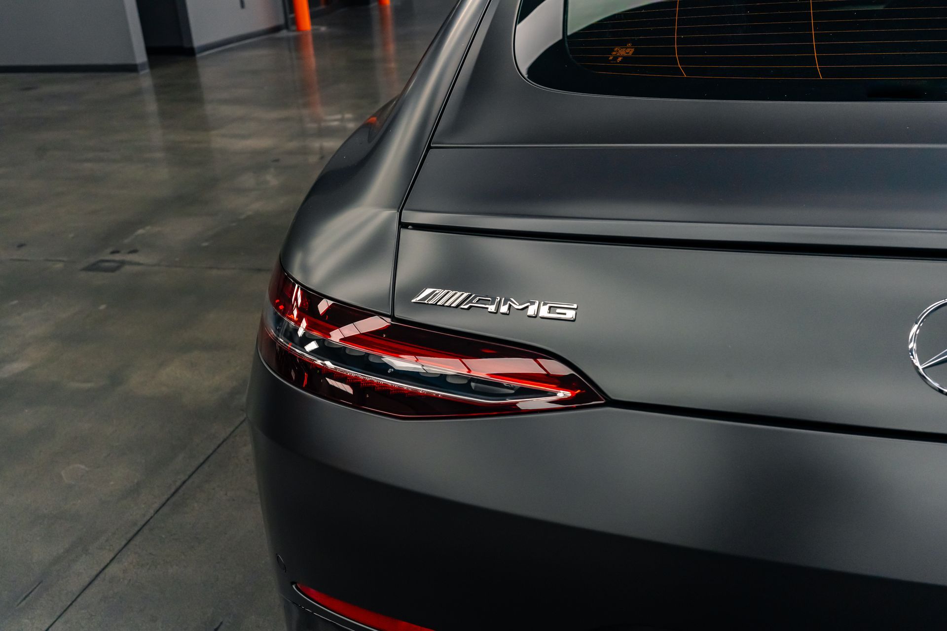 A close up of the back of a mercedes amg car