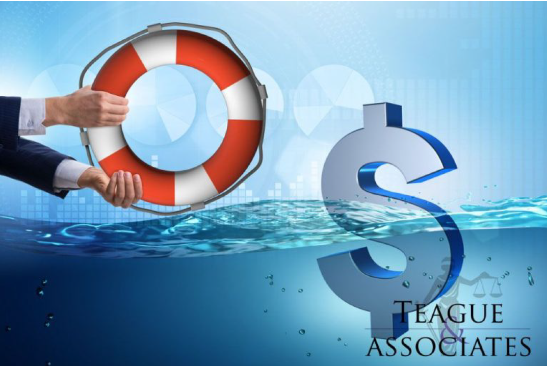 Person Holding a Life Preserver Next to a Dollar Sign — Florissant, MO — Teague & Associates, LLC