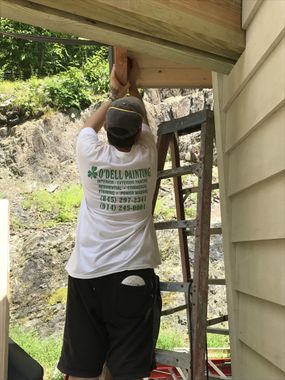 Cleaning wooden terrace — painting contractors in Wappingers Falls, NY