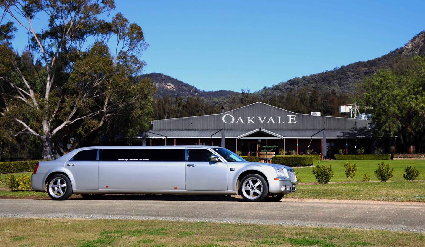 Chauffeur driving car — Limousine Hire in Central Coast, NSW