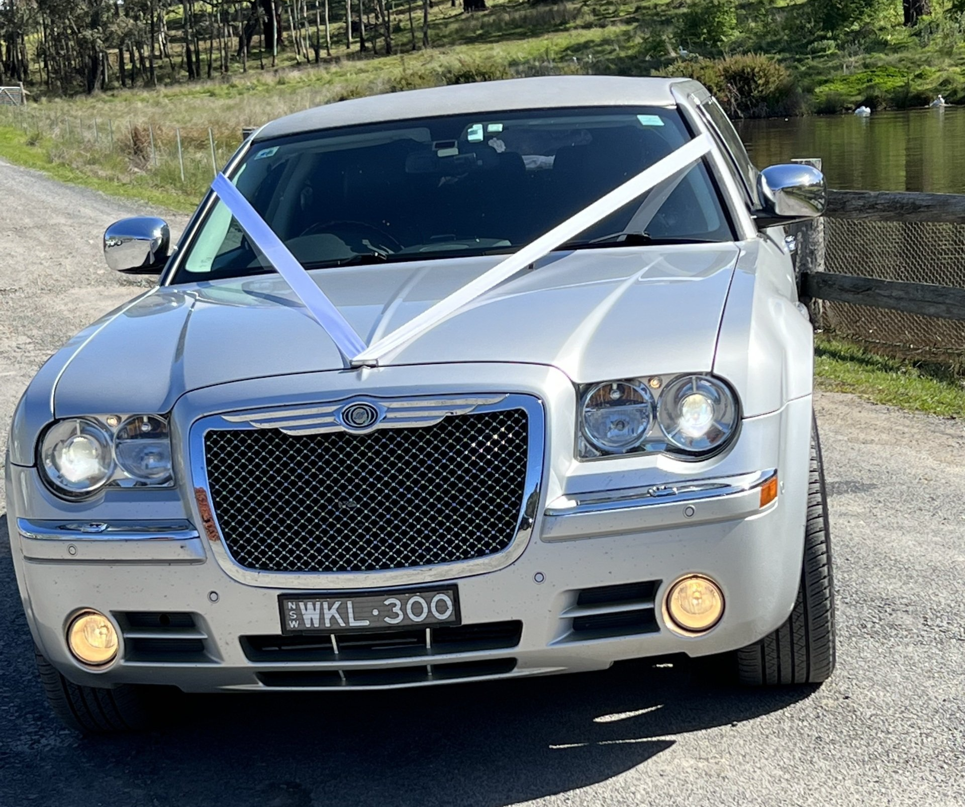 Bride sitting on bus — Limousine Hire in Central Coast, NSW