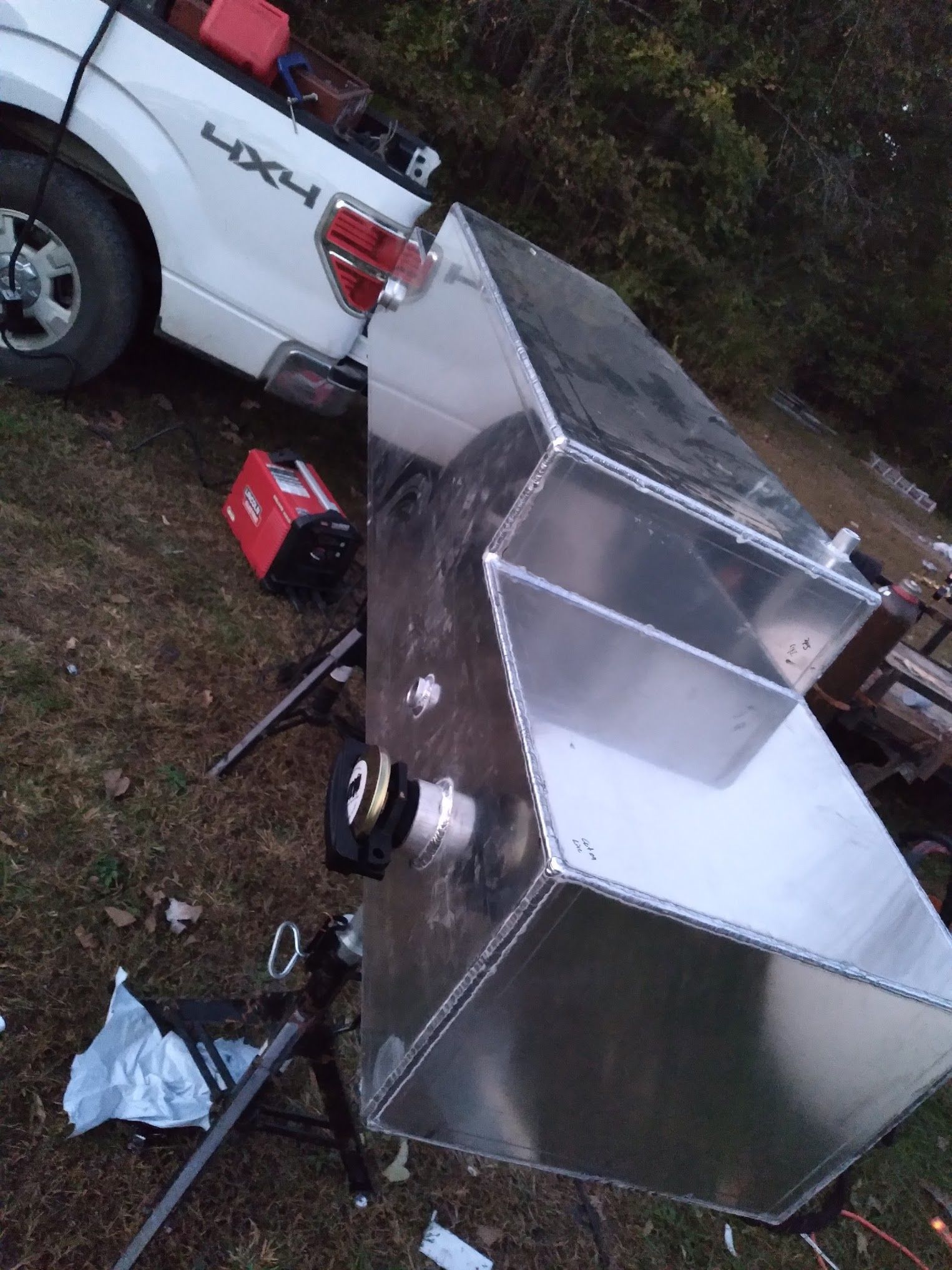 A white truck with the word 4x4 on the back