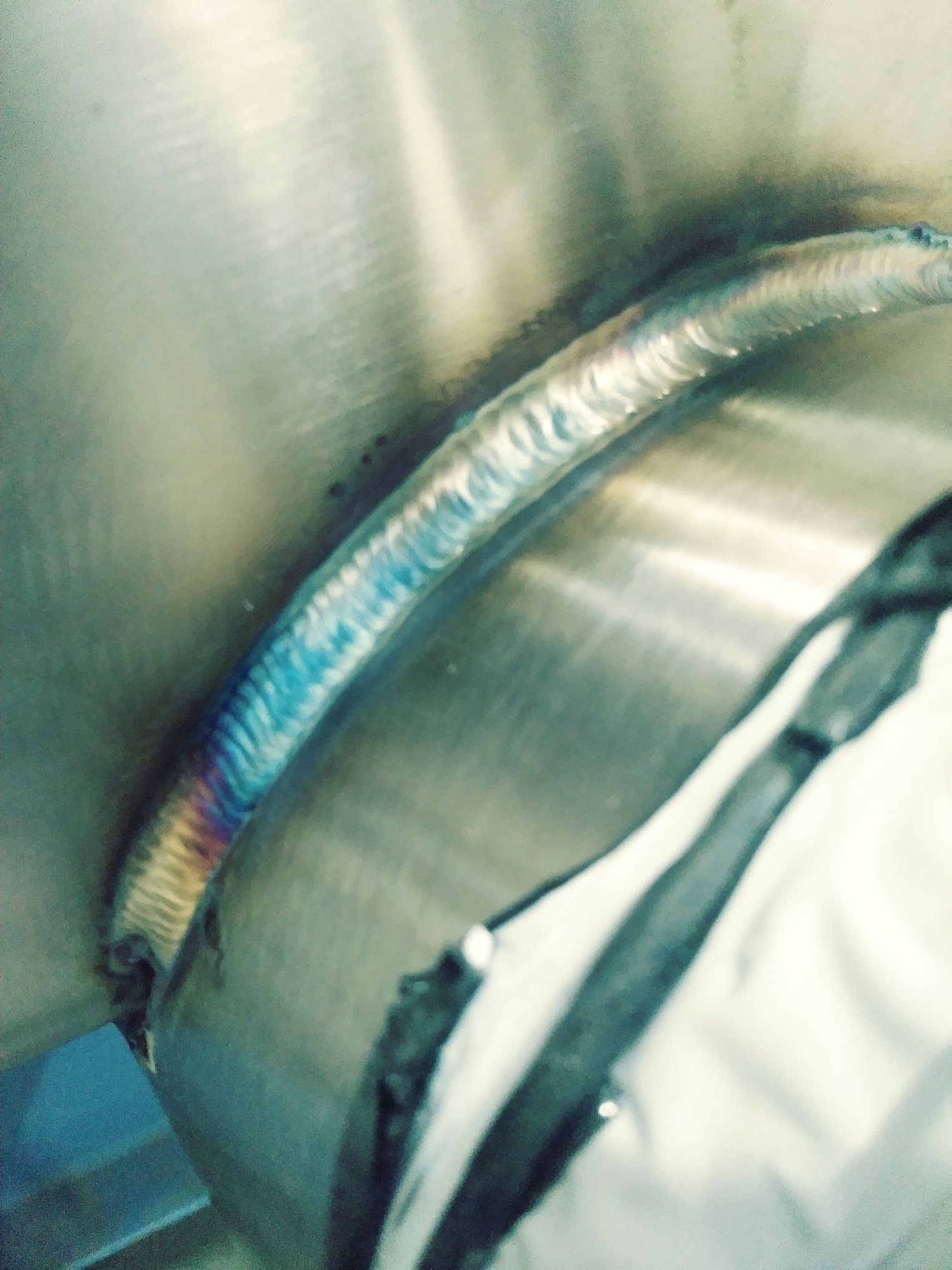 A close up of a welding joint on a metal surface