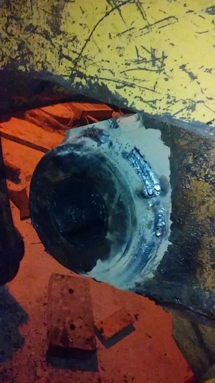 A close up of a wheel with a hole in it.