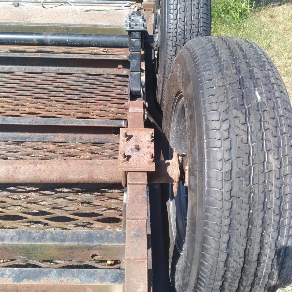 A close up of a tire on a trailer