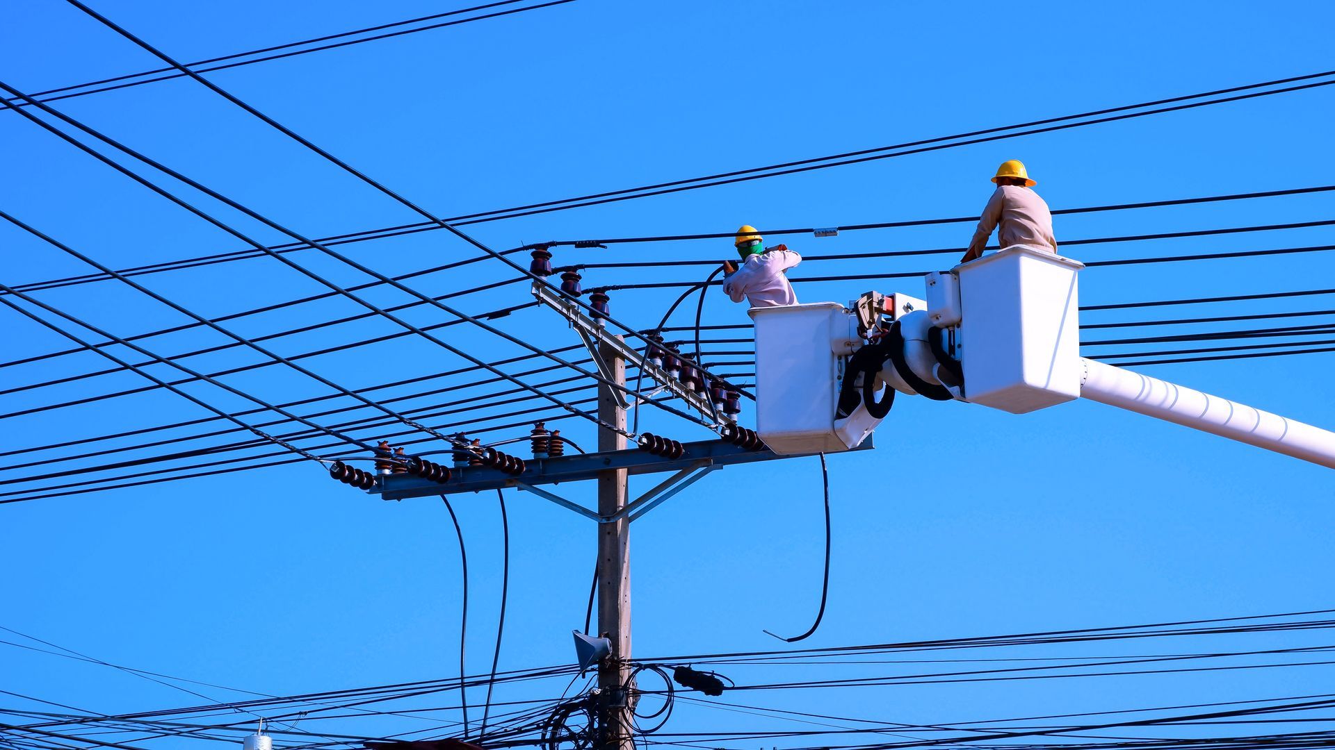Electricians Installing Power Lines — Newcastle, NSW — Mainlec Australia Pty Ltd