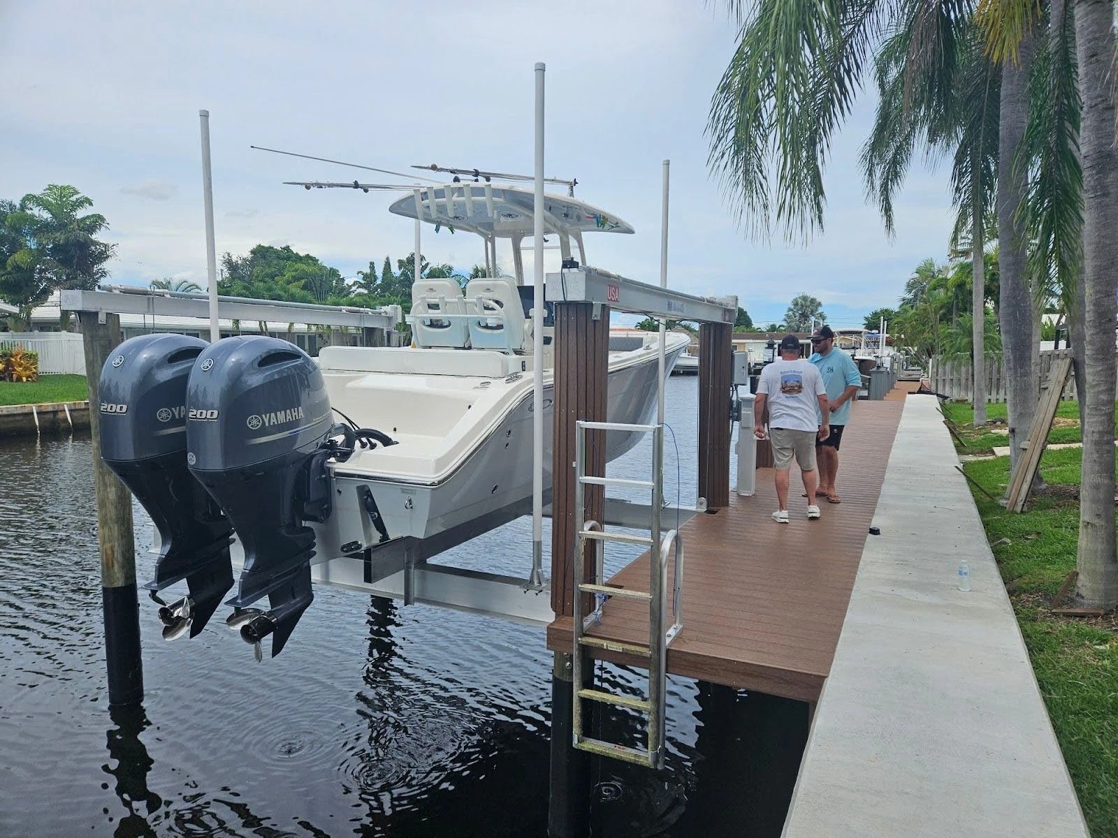 A boat is docked at a dock next to a dock.