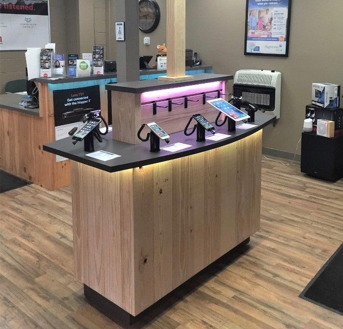 A display of cell phones and tablets in a store