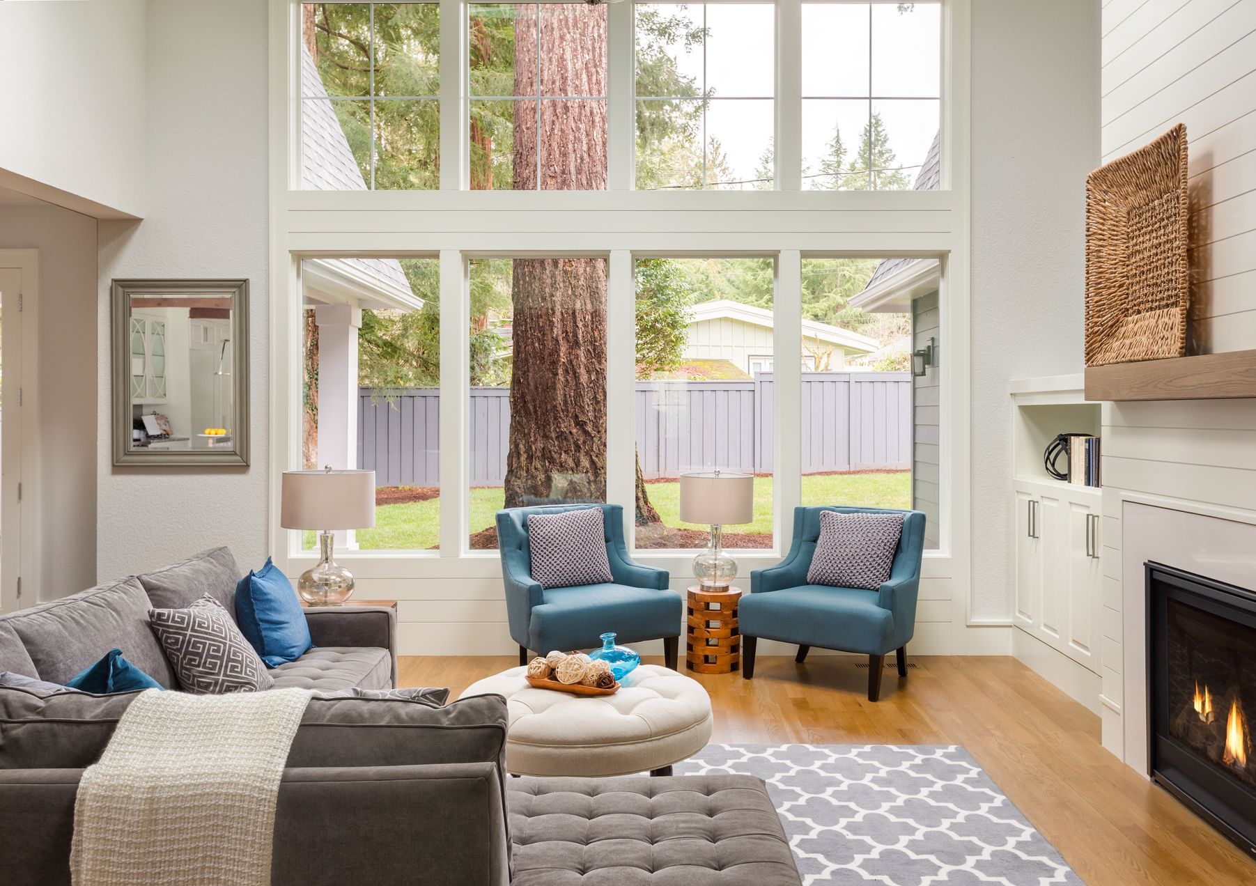 A living room filled with furniture and a fireplace.